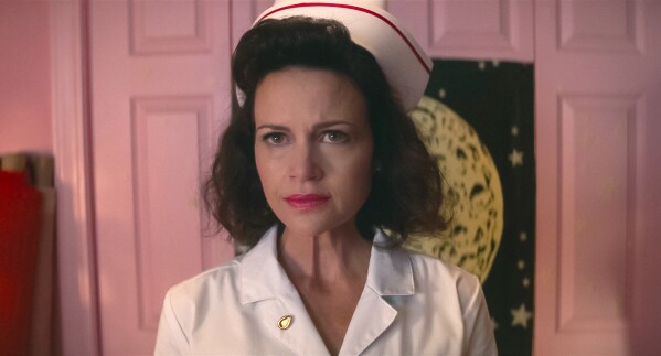 This image released by Focus Features shows Carla Gugino in a scene from "Lisa Frankenstein." (Focus Features via 麻豆传媒app)