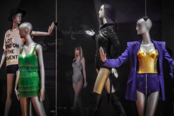 Costumes worn by singer Taylor Swift, part of the exhibition,"Taylor Swift: Storyteller," are displayed at the Museum of Arts and Design in New York on Tuesday, May 23, 2023. The exhibit runs through Sept. 4. (AP Photo/Bebeto Matthews)
