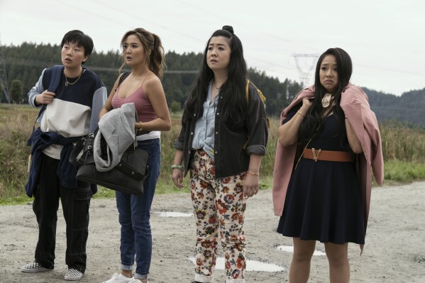 This image released by Lionsgate shows Sabrina Wu as Deadeye, from left, Ashley Park as Audrey, Sherry Cola as Lolo, and Stephanie Hsu as Kat, in a scene from "Joy Ride." (Ed Araquel/Lionsgate via AP)