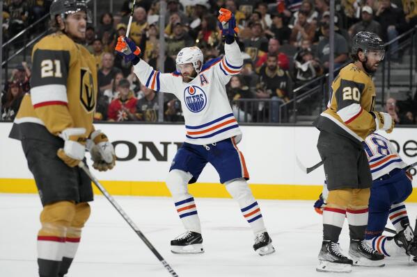 Edmonton Oilers center Leon Draisaitl (29) celebrates after scoring against the Vegas Golden Knights during the first period of Game 2 of an NHL hockey Stanley Cup second-round playoff series Saturday, May 6, 2023, in Las Vegas. (AP Photo/John Locher)