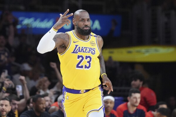LeBron James becomes first to score 50,000 combined points in NBA | AP News