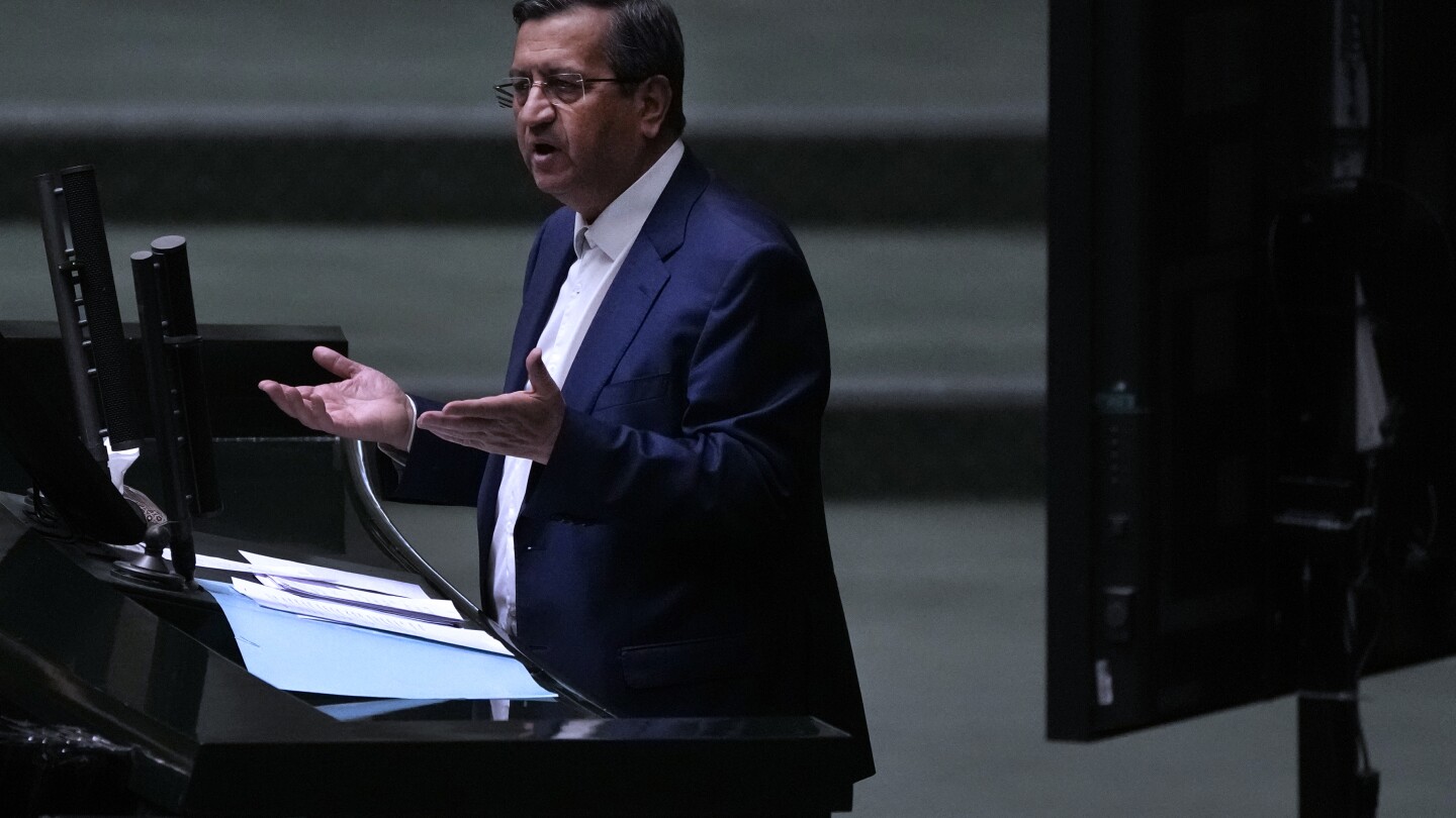 Iran’s parliament fires minister of finance over plummeting rial, mismanagement