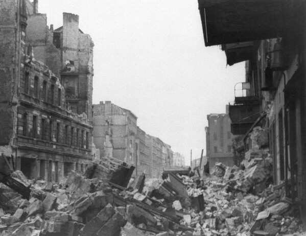 Wreckage and debris fill Frankfurter Allee near Lasdehner Strasse in a working district in the eastern section of Berlin on July 31, 1945, following an allied aerial attack on Feb. 26, 1945, prior to the fall of the city. (AP Photo, File)