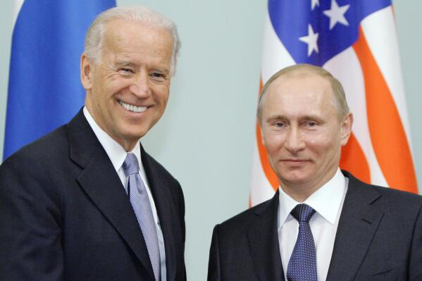 FILE - In this March 10, 2011 file photo, then Vice President  Joe Biden, left, shakes hands with Russian Prime Minister Vladimir Putin in Moscow, Russia.  At a low point in U.S.-Russian relations, President Joe Biden and Russian President Vladimir Putin appear to agree broadly on at least one thing — their first face-to-face meeting is a chance to set the stage for a new era in arms control.  (RIA Novosti, Alexei Druzhinin/Pool via AP, file)