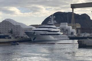 FILE - The yacht Amore Vero is docked in the Mediterranean resort of La Ciotat, France, Thursday, March 3, 2022. French authorities have seized the yacht linked to Igor Sechin, a Putin ally who runs Russian oil giant Rosneft, as part of EU sanctions over Russia's invasion of Ukraine. The boat arrived in La Ciotat on Jan. 3 for repairs and was slated to stay until April 1 and was seized to prevent an attempted departure. (AP Photo/Bishr Eltoni, File)