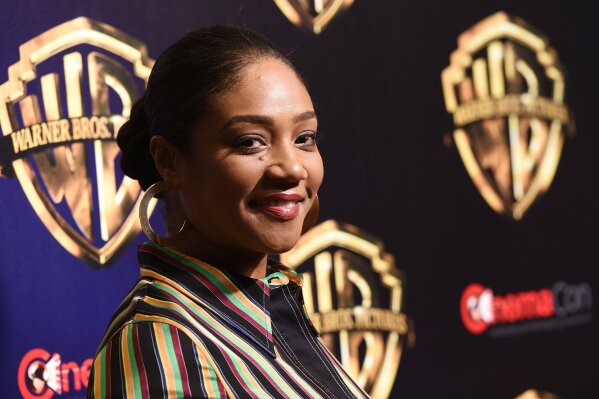 
              Tiffany Haddish, a cast member in the upcoming film "The Kitchen," poses before the Warner Bros. presentation at CinemaCon 2019, the official convention of the National Association of Theatre Owners (NATO) at Caesars Palace, Tuesday, April 2, 2019, in Las Vegas. (Photo by Chris Pizzello/Invision/AP)
            