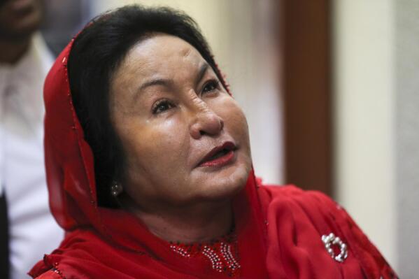 FILE - Rosmah Mansor, wife of former Malaysian Prime Minister Najib Razak, arrives at Kuala Lumpur High Court in Kuala Lumpur, Malaysia, on June 18, 2019. Malaysia’s top court on Saturday, Aug. 27, 2022, condemned as a smear attempt the leaking of what was described as a guilty verdict against Rosmah Mansor, the wife of jailed former Prime Minister Najib Razak, at her trial over alleged bribes for a solar energy project. (AP Photo/Vincent Thian, File)
