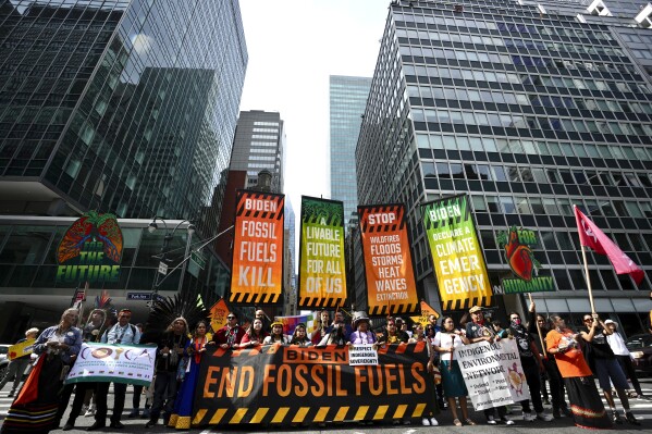 Climate activists block traffic on Park Avenue during a march protesting energy policies and the use of fossil fuels, in New York, Sunday, Sept. 17, 2023. (AP Photo / Bryan Woolston)