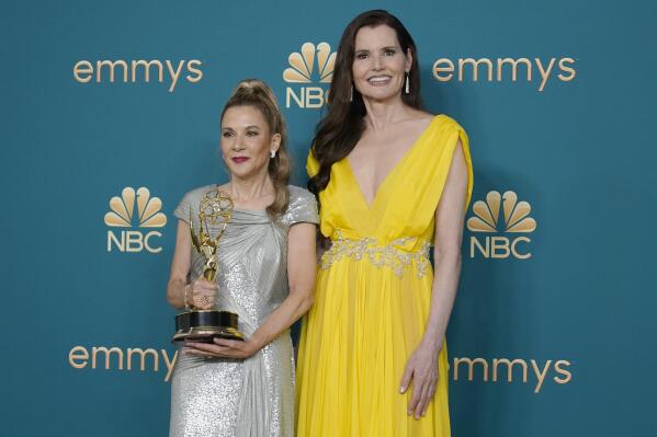 Madeline Di Nonno, left, and Geena Davis pose in the press room with the Governors award on behalf of the Geena Davis Institute on Gender in Media at the 74th Primetime Emmy Awards on Monday, Sept. 12, 2022, at the Microsoft Theater in Los Angeles. (AP Photo/Jae C. Hong)