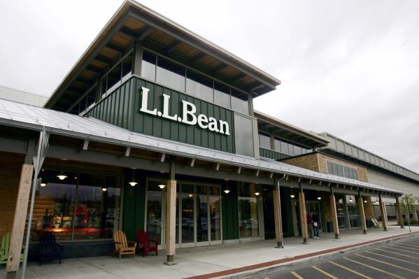 FILE- This Oct. 11, 2007, file photo shows a L.L. Bean store in Colonie, N.Y. Republican President-elect Donald Trump on Thursday, Jan. 12, 2017, urged people to buy from outdoors retailer L.L. Bean — even though many of its products are made in China — as it faces calls for a boycott because of a company heiress' donations to his candidacy. (AP Photo/Mike Groll, File)