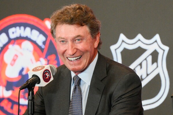 Wayne Gretzky speaks at a press conference after an NHL hockey game between the Washington Capitals and the Chicago Blackhawks, Friday, April 4, 2025, in Washington. (AP Photo/Nick Wass, File)