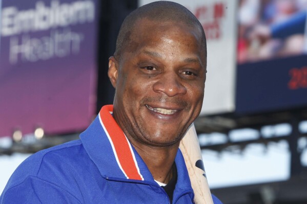 FILE - Former New York Mets baseball player Darryl Strawberry poses at Citi Field in New York Aug. 1, 2010. Former New York Mets and Yankees star Darryl Strawberry is recovering from a heart attack and is at SSM Health St. Joseph Hospital. Mets spokesman Jay Horwitz said Tuesday, March 12, 2024, that Strawberry was stricken Monday, a day before the eight-time All-Star's 62nd birthday. (AP Photo/Seth Wenig, File)