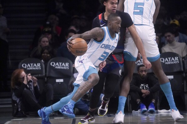 Rozier has 37 points and 13 assists, Hornets win 129-128 to snap Nets'  three-game winning streak
