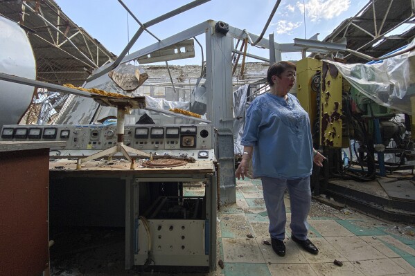 FILE - Galyna Tolstolutska, head of the department of radiation damage and radiation materials science of the National Scientific Center "Kharkov Institute of Physics and Technology" stands at her department which was heavily damaged after a Russian attack in Kharkiv, Ukraine, Thursday, May 18, 2023. Ukraine will need more than a billion dollars to rebuild its scientific infrastructure that was damaged or destroyed during two years of Russia's war on its neighbor, the United Nations' cultural and scientific agency said in a report that was released on Monday, March 10 2024 (AP Photo/Oleksandr Brynza, File)
