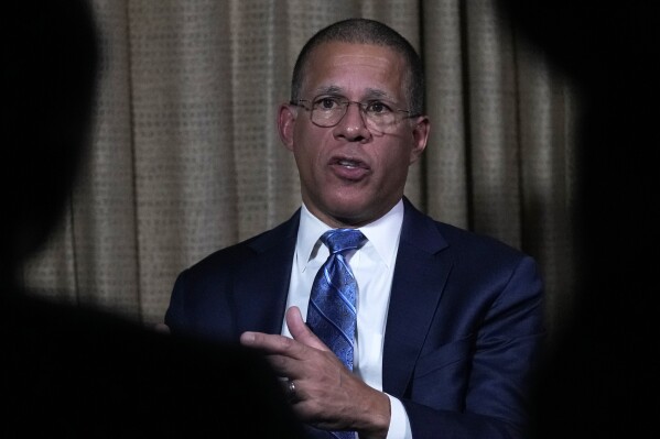 Anthony Brown, Attorney General of Maryland, answers a question during an interview at the State Attorneys General Association meetings , Thursday, Nov. 16, 2023, in Boston. In exclusive sit-down interviews with The Associated Press, several Black Democrat attorneys general discuss the role race and politics plays in their jobs. (AP Photo/Charles Krupa)