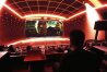 Immersive visuals surround a scene from the film "The Matrix" during a press preview for "The Matrix in Shared Reality" on Wednesday, May 28, 2025, at Cosm Los Angeles in Inglewood, Calif. (AP Photo/Chris Pizzello)