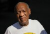 FILE - Bill Cosby reacts outside his home in Elkins Park, Pa., Wednesday, June 30, 2021, after being released from prison. A woman who said Cosby sexually assaulted her when she was a young comedy writer more than 50 years ago filed a lawsuit against the actor Thursday, Nov. 16, 2023, under a soon-to-expire New York law that gave victims of sexual abuse a year to file lawsuits for decades-old allegations. (AP Photo/Matt Slocum, File)