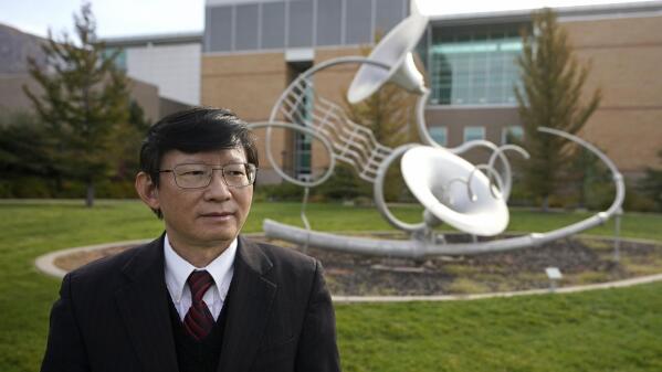 Taowen Le, a Weber State University professor of information systems and technologies, iposes for a photo at Weber State University on Oct. 11, 2022, in Ogden, Utah. An investigation by the Associated Press has found that China and its U.S.-based advocates spent years building relationships with the Utah's officials and lawmakers (AP Photo/Rick Bowmer)