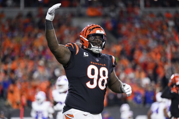 Cincinnati Bengals defensive tackle D.J. Reader (98) celebrates a stop during the team's NFL football game against the Buffalo Bills, Nov. 5, 2023, in Cincinnati. The Detroit Lions have agreed to terms with Reader on a two-year contract worth up to $27.5 million, a person familiar with the terms told The Associated Press. The person spoke to the AP on condition of anonymity Thursday, March 14, because the deal hasn’t been finalized. (AP Photo/Zach Bolinger, File)