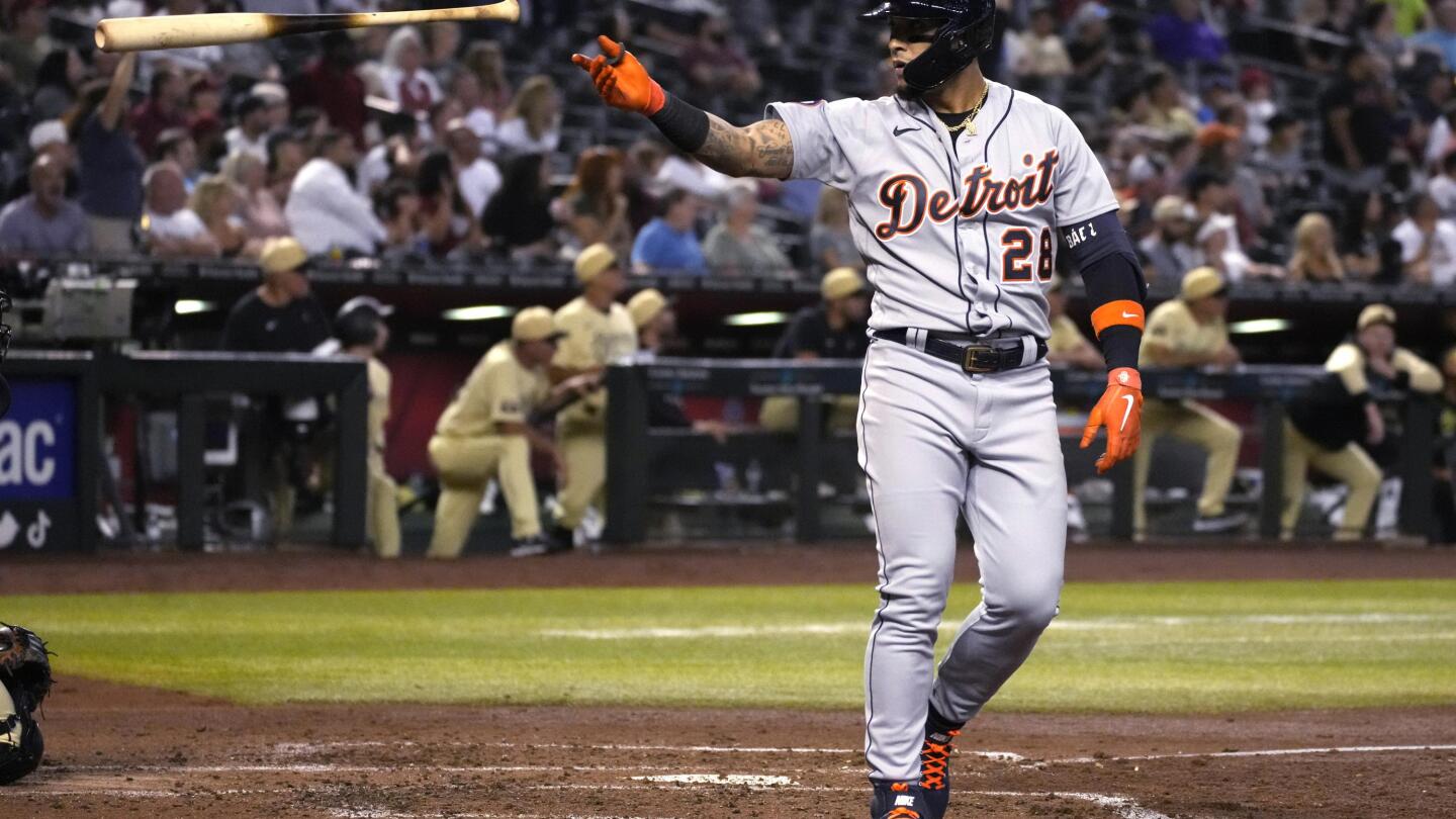 ANAHEIM, CA - SEPTEMBER 15: Detroit Tigers shortstop Javier Baez (28) in  the dugout wearing a hockey helmet after hitting a solo home run in the  fourth inning of an MLB baseball