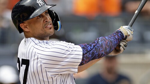 New York Yankees' Giancarlo Stanton hits a two-run home run during the fifth inning of a baseball game against the Chicago Cubs, Saturday, July 8, 2023, in New York. (AP Photo/Adam Hunger)