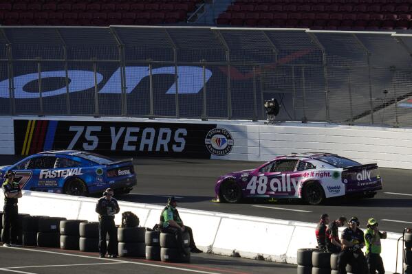 NASCAR Cup Series drivers Chris Buescher (17) and Alex Bowman (48) participate during a practice session ahead of a NASCAR exhibition auto race at Los Angeles Memorial Coliseum, Saturday, Feb. 4, 2023, in Los Angeles. (AP Photo/Ashley Landis)