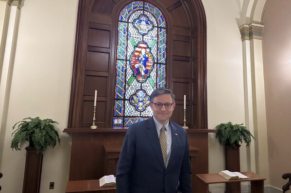 House Speaker Mike Johnson of La., poses for a photo in the Congressional Prayer Room at the U.S. Capitol Wednesday, May 21, 2025, in Washington. (AP Photo/Lisa Mascaro)