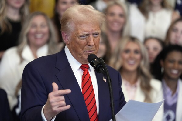 Trump signs executive order intended to bar transgender athletes from girls' and women's sports | AP News