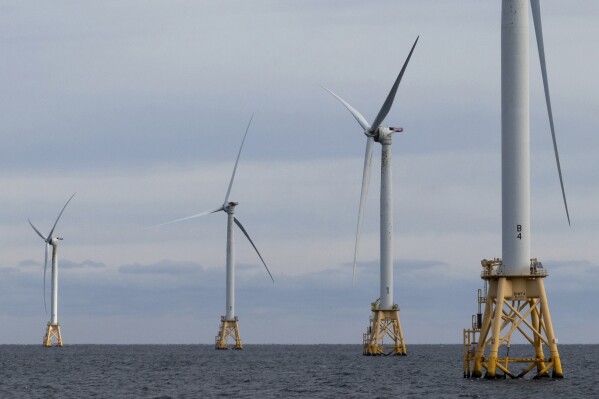 FILE - Turbines operate at the Block Island Wind Farm, Dec. 7, 2023, off the coast of Block Island, R.I. The Massachusetts Senate debated a bill Tuesday, June 25, 2024 aimed at expanding the adoption of renewable energy in a bid to to help Massachusetts get one step closer to meeting its aggressive climate goals, including reaching net zero greenhouse gas emissions by 2050. (AP Photo/Julia Nikhinson, File)