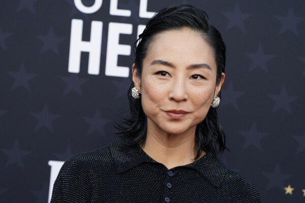 Greta Lee arrives at the 29th Critics Choice Awards on Sunday, Jan. 14, 2024, at the Barker Hangar in Santa Monica, Calif. (Photo by Jordan Strauss/Invision/AP)