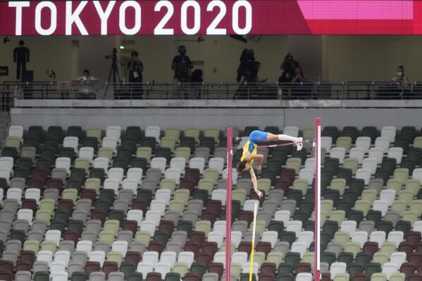 Armand Duplantis, of Sweden fails with the world record attempt after winning the gold in the final of the men's pole vault at the 2020 Summer Olympics, Tuesday, Aug. 3, 2021, in Tokyo. (AP Photo/Martin Meissner)