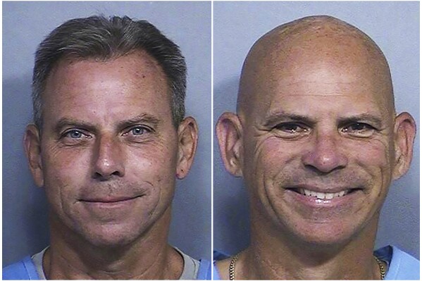 This combination of two booking photos provided by the California Department of Corrections shows Erik Menendez, left, and Lyle Menendez. (California Department of Corrections via AP, File)