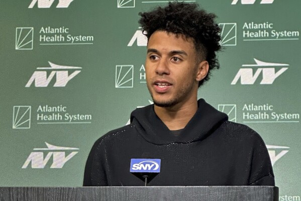New York Jets quarterback Jordan Travis speaks to reporters during the team's rookie minicamp in Florham Park, N.J., on May 4, 2024. (AP Photo/Dennis Waszak Jr.)