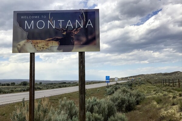 A 'Welcome to Montana" sign is seen along Montana State Highway 72 near Chance, Mont., on May 24, 2017. The general election for a race that could determine the Senate majority begins right after Montana voters lock in their nominees in the Tuesday, June 4, 2024, primaries.(AP Photo/Robert Yoon)