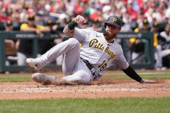 Pittsburgh Pirates' Ben Gamel scores on a wild pitch by St. Louis Cardinals starting pitcher Jake Woodford during the fourth inning of a baseball game Sunday, April 10, 2022, in St. Louis. (AP Photo/Jeff Roberson)