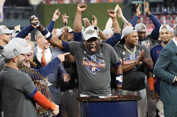 Houston Astros manager Dusty Baker Jr. and the Houston Astros celebrate their 4-1 World Series win against the Philadelphia Phillies in Game 6 on Saturday, Nov. 5, 2022, in Houston. (AP Photo/David J. Phillip)