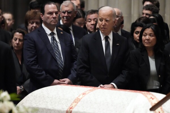 President Joe Biden attends a funeral service for retired Supreme Court Justice Sandra Day O'Connor at the Washington National Cathedral, Tuesday, Dec. 19, 2023, in Washington. O'Connor, an Arizona native and the first woman to serve on the nation's highest court, died on Dec. 1 at age 93. (AP Photo/Jacquelyn Martin)