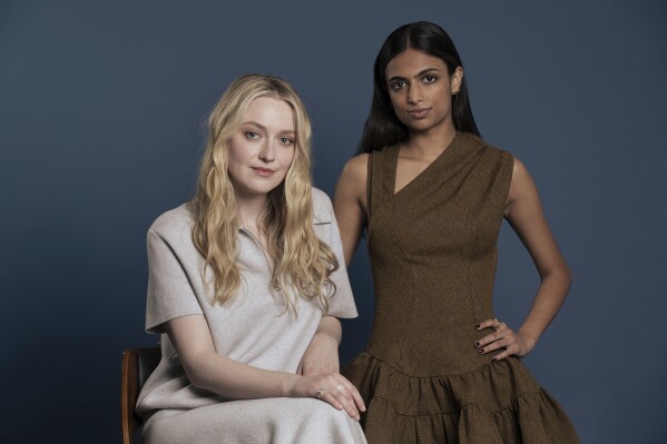 Dakota Fanning, left, and Ishana Night Shyamalan pose for a portrait to promote "The Watchers," Thursday, May 23, 2024, in Beverly Hills, Calif. (Photo by Rebecca Cabage/Invision/AP)