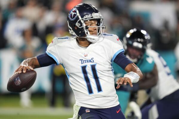 FILE -Tennessee Titans quarterback Joshua Dobbs (11) passes in the second half of an NFL football game against the Jacksonville Jaguars, Saturday, Jan. 7, 2023, in Jacksonville, Fla. Dobbs was just one of many quarterbacks thrown into the heat of battle due to a rash of injuries at the league's premier position, making devising a game plan even more challenging. (AP Photo/John Raoux, File)