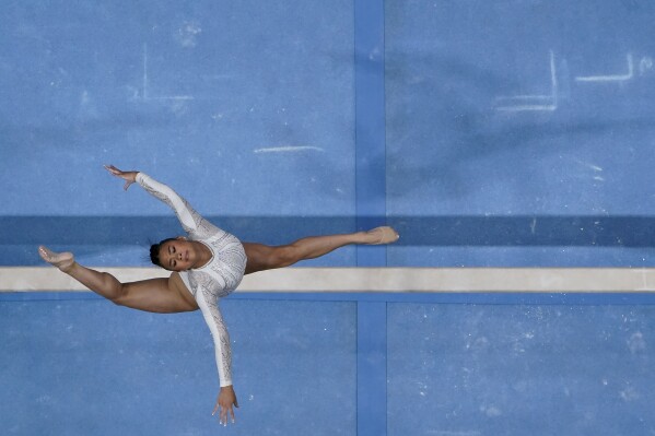 Sunisa Lee competes on the beam during the U.S. Gymnastics Championships, Sunday, Aug. 27, 2023, in San Jose, Calif. (AP Photo/Godofredo A. Vásquez)