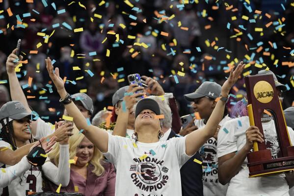 FILE - South Carolina head coach Dawn Staley celebrates after a college basketball game in the final round of the Women's Final Four NCAA tournament against UConn, April 3, 2022, in Minneapolis. South Carolina won 64-49 to win the championship. (AP Photo/Eric Gay, File)