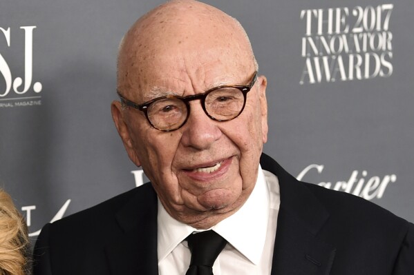 FILE - Rupert Murdoch attends the WSJ. Magazine 2017 Innovator Awards at The Museum of Modern Art in New York on Nov. 1, 2017. The media magnate is stepping down as chairman of News Corp. and Fox Corp., the companies that he built into forces over the last 50 years. He will become chairman emeritus of both corporations, the company announced on Thursday. His son, Lachlan, will control both companies. (Photo by Evan Agostini/Invision/AP, File)