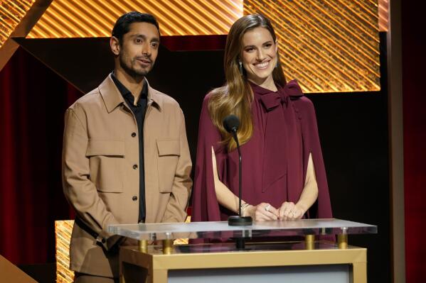 Riz Ahmed, left, and Allison Williams speak at the 95th Academy Awards nomination ceremony on Tuesday, Jan. 24, 2023, at the Academy Museum in Los Angeles. The 95th annual Academy Awards will take place on Sunday, March 12, 2023, at the Dolby Theatre in Los Angeles. (AP Photo/Jae C. Hong)