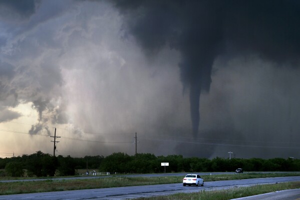 Tornadoes spotted in Oklahoma as hail pelts Kansas | AP News