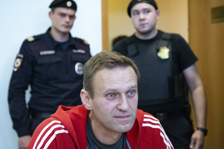 FILE - Russian opposition leader Alexei Navalny speaks to the media prior to a court session in Moscow, on Aug. 22, 2019. Alexei Navalny, the fiercest foe of Russian President Vladimir Putin who crusaded against official corruption and staged massive anti-Kremlin protests, died in prison Friday Feb. 16, 2024 Russia’s prison agency said. He was 47. (AP Photo/Alexander Zemlianichenko, File)