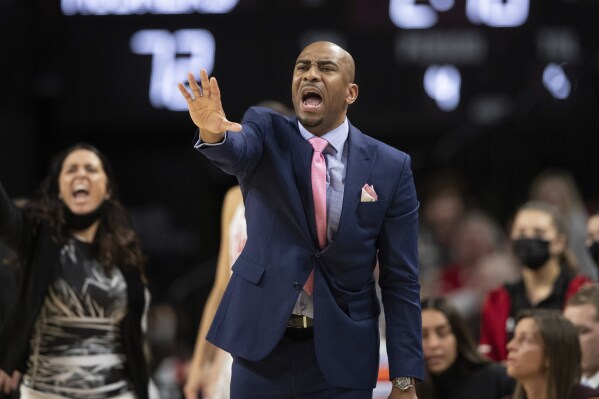 FILE - Nebraska associate head coach Chuck Love speaks to players from the sideline as they play against Michigan during the second half of an NCAA college basketball game Tuesday, Jan. 4, 2022, in Lincoln, Neb. A former Nebraska women's basketball player alleges coach Amy Williams and athletic director Trev Alberts did not take appropriate action when her sexual relationship with an assistant coach became widely known. Ashley Scoggin filed a civil lawsuit on Sunday, Feb. 18, 2024, in U.S. District Court describing how Love allegedly took a special interest in her and how the relationship turned sexual and caused Scoggin to fear retaliation if she refused to engage in it. (AP Photo/Rebecca S. Gratz, File)