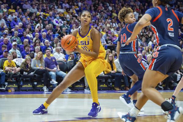 LSU's Angel Reese, left, looks to shoot against Auburn during an NCAA college basketball game in Baton Rouge, La., Sunday, Jan. 15, 2023. (Scott Clause/The Daily Advertiser via AP)