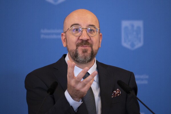 European Council President Charles Michel gestures during a press conference with Romanian President Klaus Iohannis at the Cotroceni Presidential Palace in Bucharest, Romania, Wednesday, April 3, 2024. (AP Photo/Andreea Alexandru)