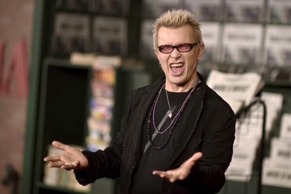 FILE - Billy Idol appears at the Los Angeles premiere of "The Irishman" on Oct. 24, 2019. Idol will headline a pre-game concert ahead of the Super Bowl on Feb. 11 just outside Allegiant Stadium, where the NFL’s two best teams face off. (Photo by Richard Shotwell/Invision/AP, File)