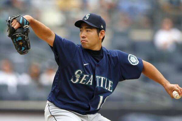 Seattle Mariners starting pitcher Yusei Kikuchi (18) throws against the New York Yankees during the second inning of a baseball game Sunday, Aug. 8, 2021, in New York. (AP Photo/Noah K. Murray)